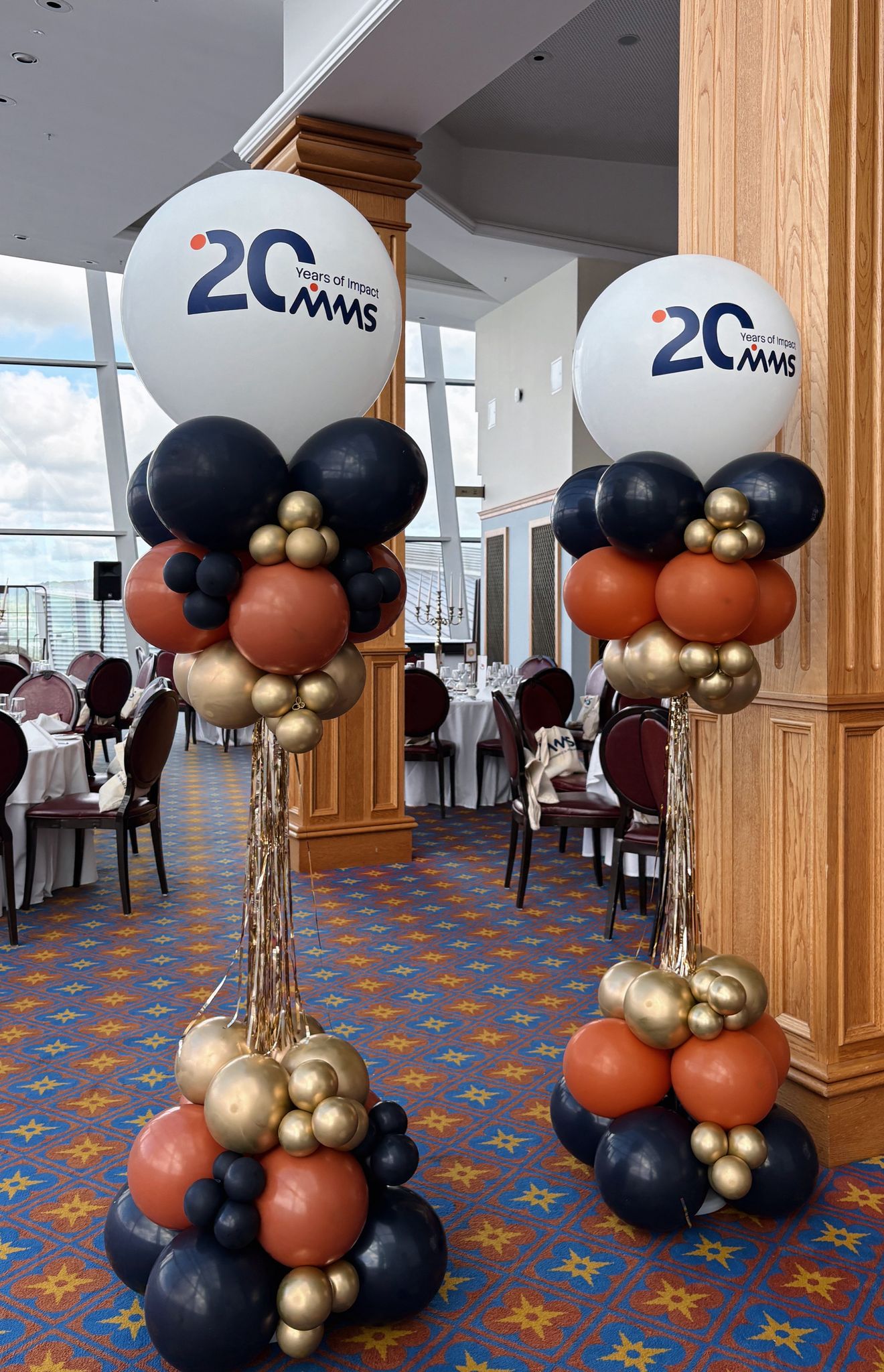 MMS branded balloon columns for corporate event