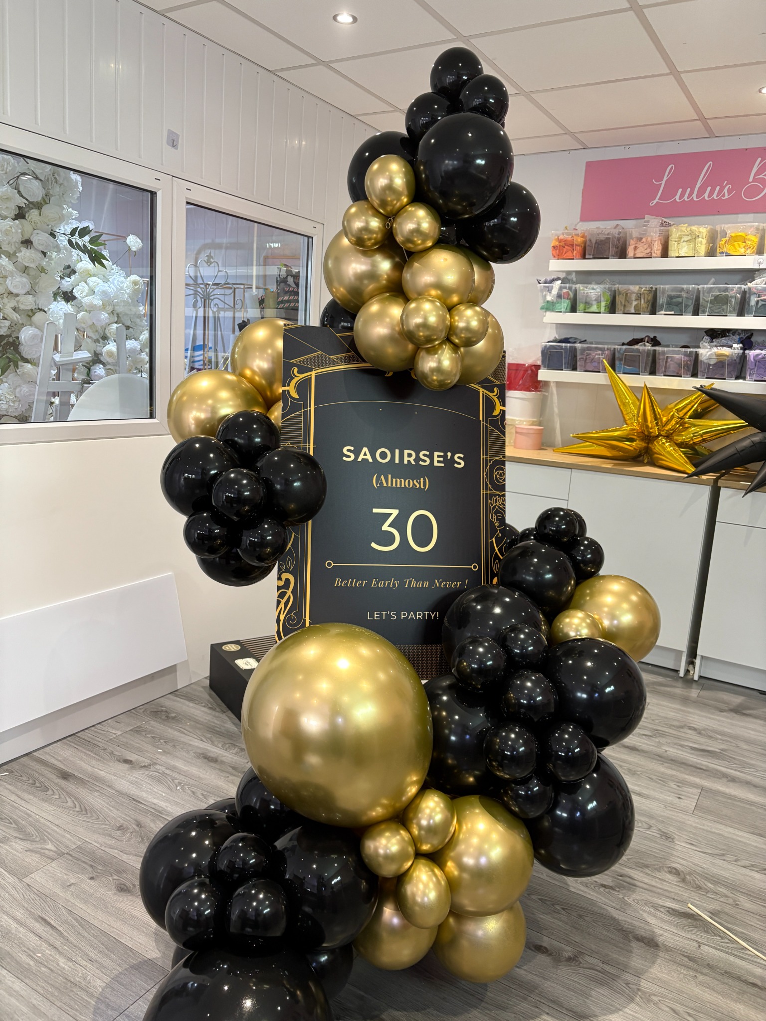 30th birthday black and gold balloon display